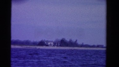 1958: Boat on Minnesota Lake with Men Enjoying Leisure Time