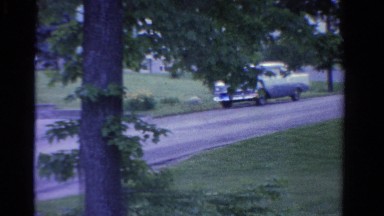 1958: modest bungalow in forested rural area panned MINNESOTA