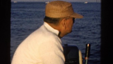 1958: old man and the sea patiently fishing the open ocean MINNESOTA