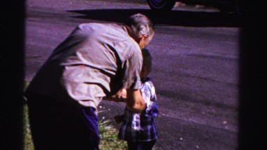 1958: sharing is caring so boy hands mother showing love MINNESOTA