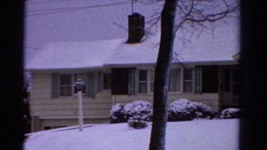 1958: exterior view of single family house in the wintertime MINNESOTA