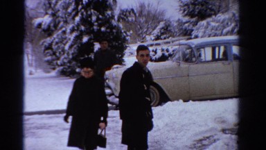 1958: people are walking to the house from the car in the winter MINNESOTA