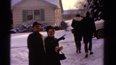 1958: people walking to their car in the winter time MINNESOTA