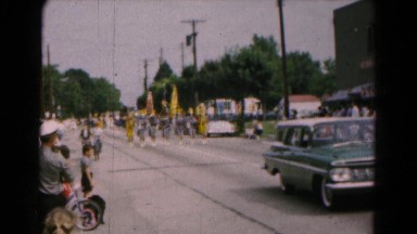 1961: parade down local street with many families watching HAGERSTOWN, MARYLAND