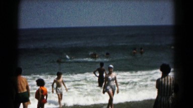 1961: surfers at the beach in the morning HAGERSTOWN, MARYLAND