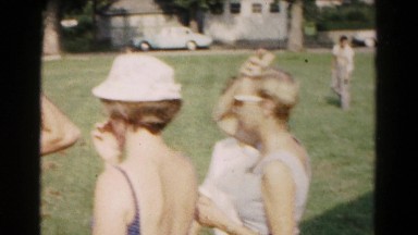 1961: baby son on dad's shoulders swings play fun times HAGERSTOWN, MARYLAND