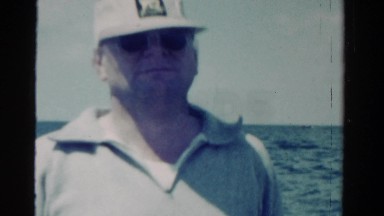 1958: Proud Caucasian Fisherman Boating on a Minnesota Lake
