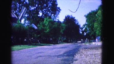 1964: Senior Women Walking on Sidewalk in Rural Jamestown, Virginia
