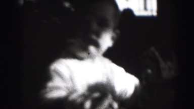 1946: double exposure baby thinks about existential living situation HARRISBURG