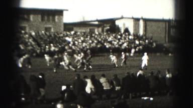 1946: people are playing american football HARRISBURG