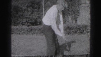 1946: handsome young man swinging golf club HARRISBURG