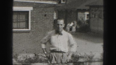 1946: three men are working in the front yard of house HARRISBURG