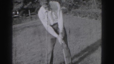 1946: Man Swinging Golf Club in Backyard Grass Harrisburg