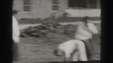 1946: outdoor scene with people playing HARRISBURG