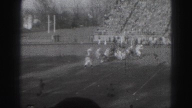 1946: stands filled with fans watching football game HARRISBURG