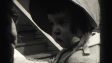 1946: precious baby girl in formal bonnet fashion dress with grandmother