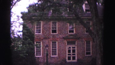 1964: Beautiful Brown-Brick Mansion Among Trees in Jamestown, Virginia