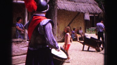 1964: man in costume in front of an amusement park general store JAMESTOWN