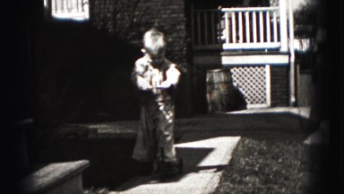 1946: little boy issuing her toy to play outdoor HARRISBURG