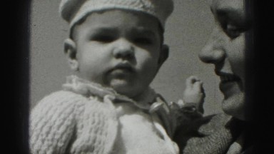 1946: beautiful young mother holding her sweet baby HARRISBURG
