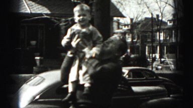 1946: man lifts little boy onto shoulder HARRISBURG