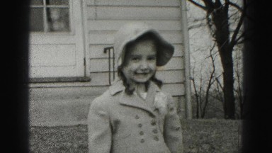 1946: little girl in cute hat is smiling HARRISBURG