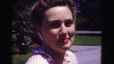 1946: beautiful well dressed woman standing outdoor in garden WASHINGTON, DC