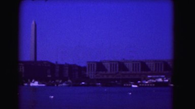 1946: city is seen with tall buildings along coastal area WASHINGTON, DC