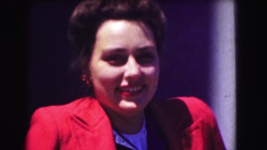 1946: woman in red jacket and man in usa military uniform WASHINGTON, DC