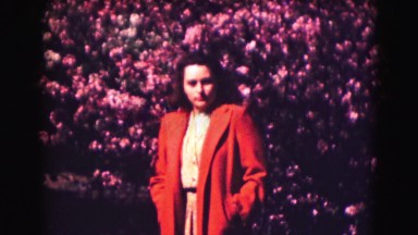 1946: women in orange next to the flowers with policeman WASHINGTON, DC