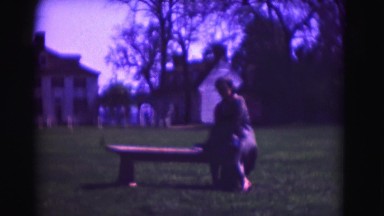 1946: old women taking rest on park bench at national park preservation site.