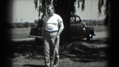 1946: male golfer demonstrates his special skills and technique while teeing off