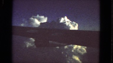 1963: The Reflection of Cloudy Sky in Crystal Clear Water California