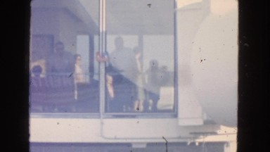 1963: watching out through the glass window CALIFORNIA