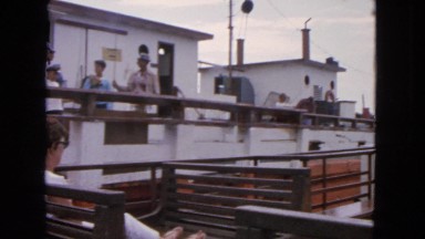 1963: two ships sailing across one another showing passengers gazing themselves