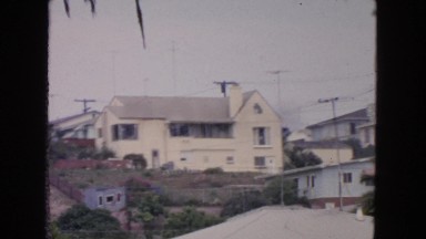 1963: residential white house home across the street in great location
