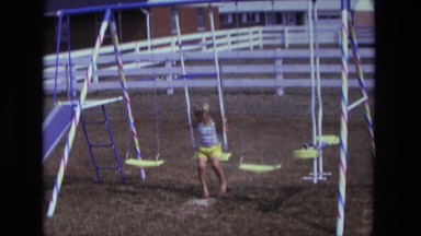 1975: sad summer is over swingset backyard melancholy shy little boy CALIFORNIA