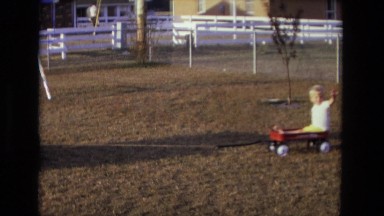 1975: father is seen playing with children CALIFORNIA