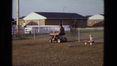 1975: father is seen playing with children CALIFORNIA