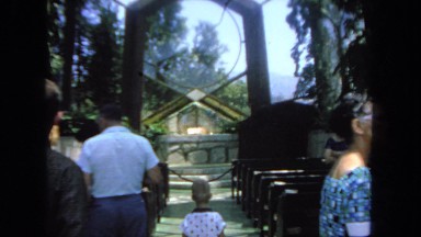 1962: people stand in bright church SAN PEDRO, CALIFORNIA