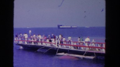 1962: people waiting on sea dock with fishing rod SAN PEDRO, CALIFORNIA
