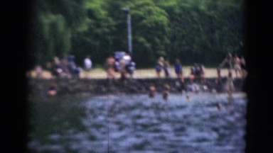 1947: people diving and cooling off while enjoying swimming near lake MIDDLETOWN