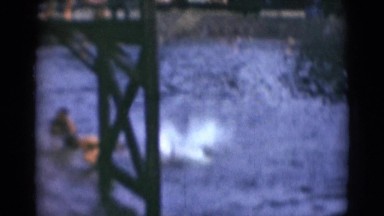 1947: teenagers are jumping in the water MIDDLETOWN