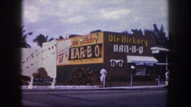 1960: bab-b-q building decorated with rope flags ,has few visitors FLORIDA