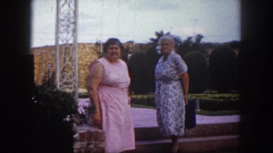 1960: two heavyset older woman standing near festival grounds FLORIDA