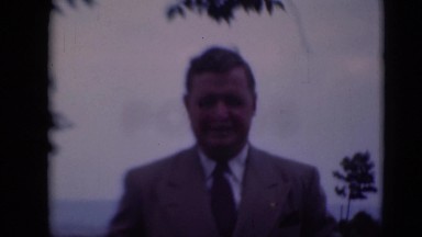 1947: man in suit is seen walking MIDDLETOWN