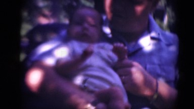 1947: father is seen playing with children MIDDLETOWN