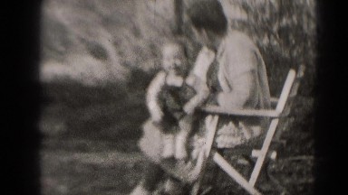 1947: father is seen playing with children MIDDLETOWN