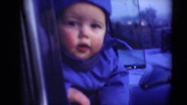 1947: baby head out of the car window ,observing things around. MIDDLETOWN