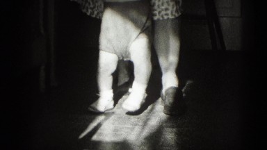 1947: woman teaches kid how to walk MIDDLETOWN